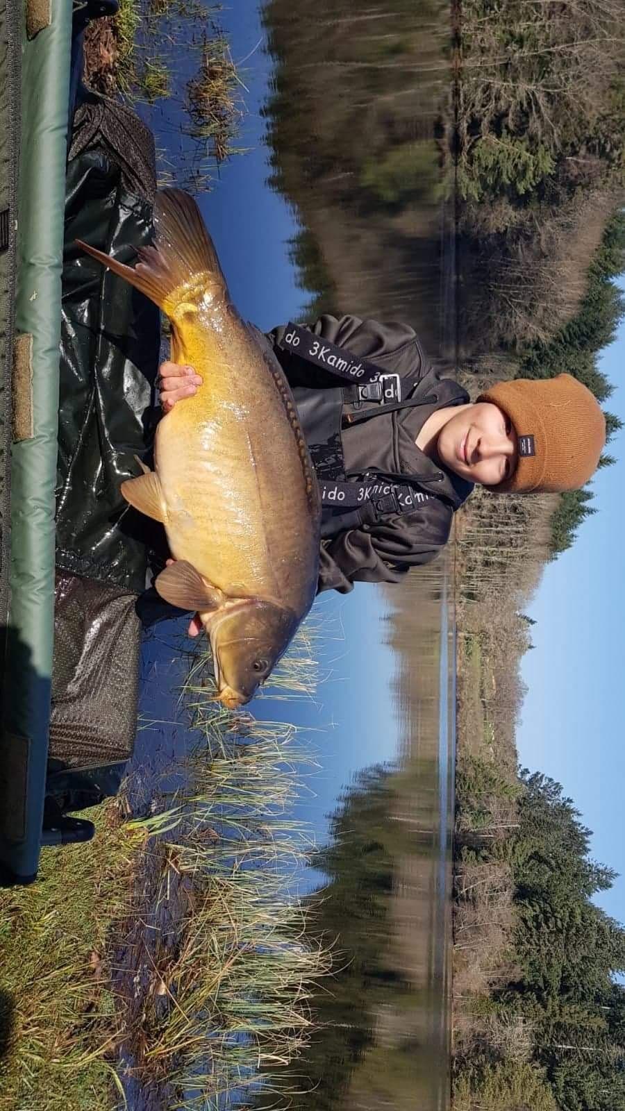 Louis avec une carpe de 9kg